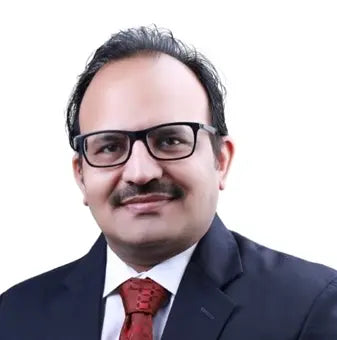 Man wearing glasses and a suit with a red tie on a white background